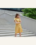 Beiges Midi-Kleid mit Schleife - Produktbild 1