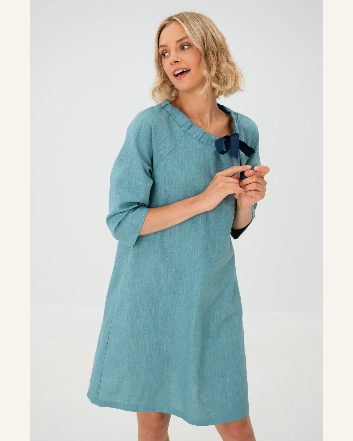 Türkisfarbenes Taschenkleid - Produktbild 3